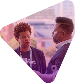 Two professionals having a business meeting at a conference